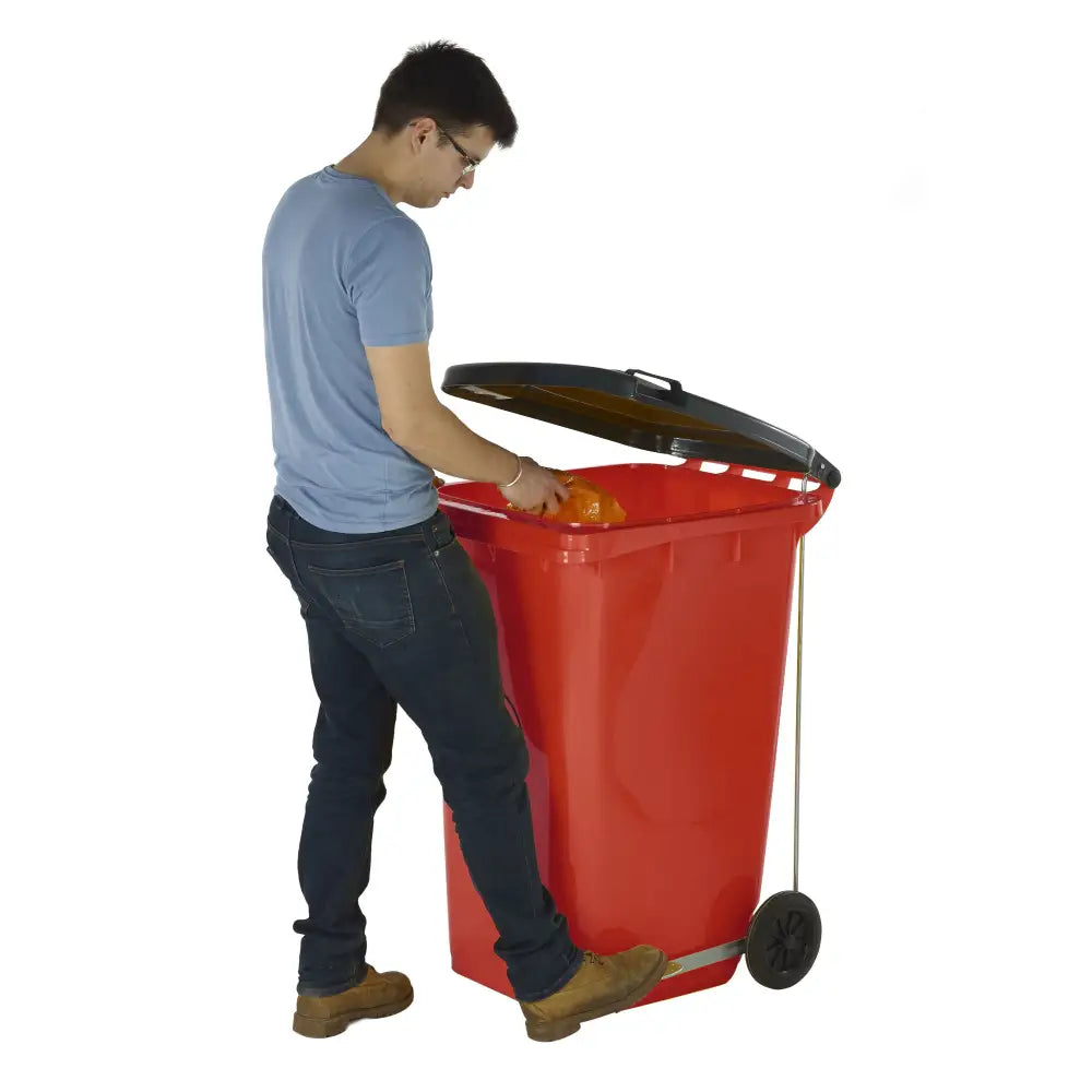 Wheeled bins with side pedal